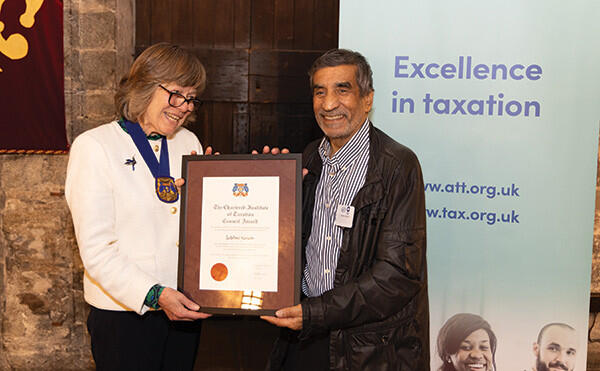 Charlotte Barbour presents Council Award to Lakshmi Narain